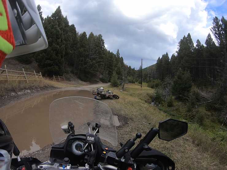 Dad drops in deep mud